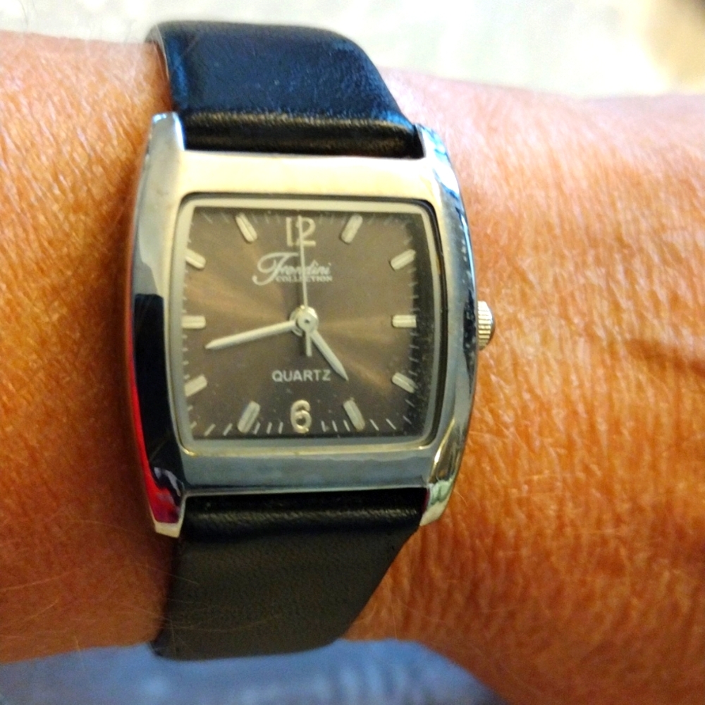 Fondini genuine leather band watch.
